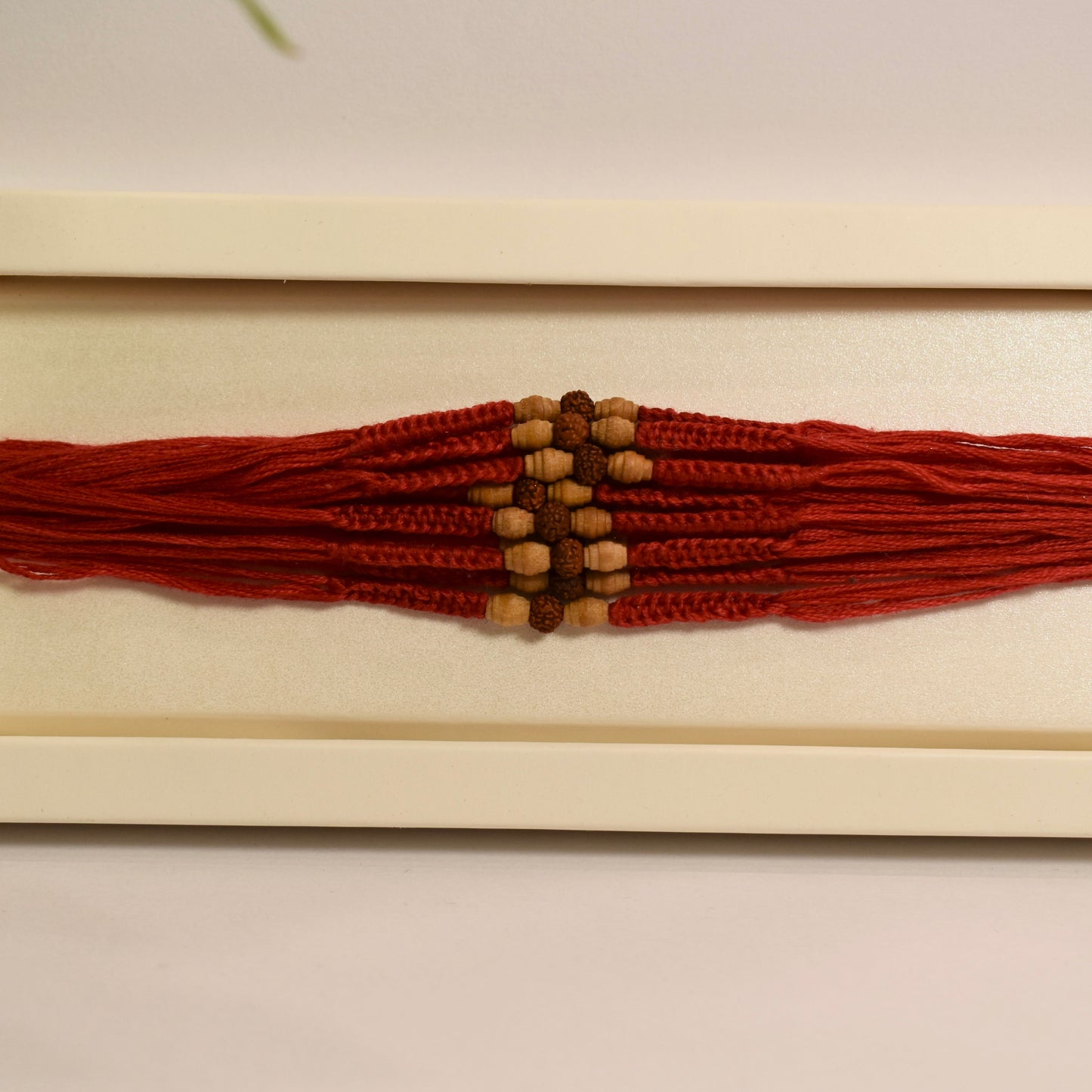 Minimal Chandan and Rudraksha Rakhi Pack of 12(Design 3)