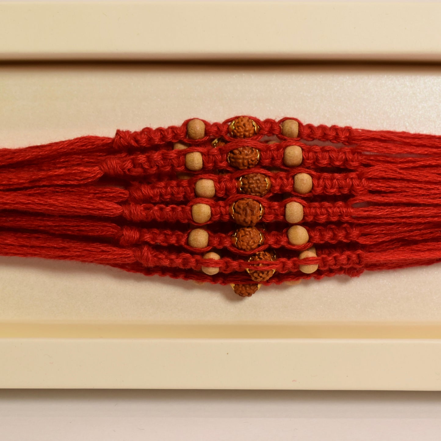 Minimal Chandan and Rudraksha Rakhi Pack of 12(Design 4)